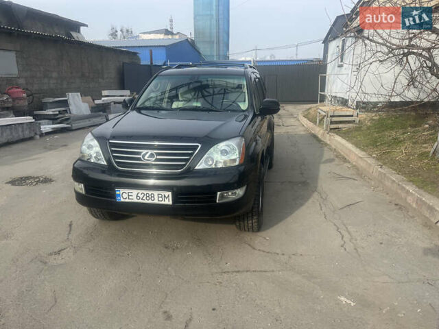Черный Лексус ГХ, объемом двигателя 4.66 л и пробегом 242 тыс. км за 13550 $, фото 1 на Automoto.ua