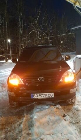 Черный Лексус ГХ, объемом двигателя 4.66 л и пробегом 328 тыс. км за 15200 $, фото 1 на Automoto.ua