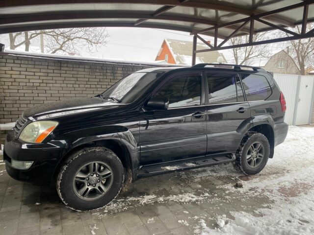 Черный Лексус ГХ, объемом двигателя 4.7 л и пробегом 210 тыс. км за 18934 $, фото 1 на Automoto.ua