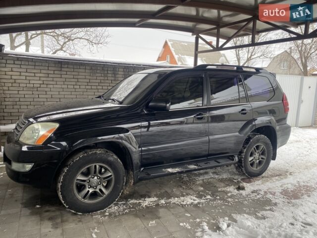 Черный Лексус ГХ, объемом двигателя 4.66 л и пробегом 210 тыс. км за 18500 $, фото 1 на Automoto.ua