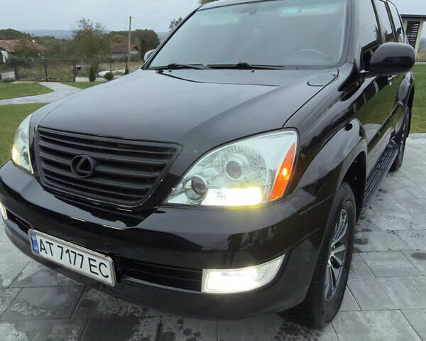 Черный Лексус ГХ, объемом двигателя 4.67 л и пробегом 270 тыс. км за 15500 $, фото 1 на Automoto.ua