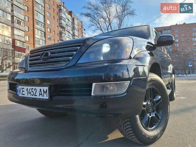 Черный Лексус ГХ, объемом двигателя 4.66 л и пробегом 290 тыс. км за 15950 $, фото 1 на Automoto.ua