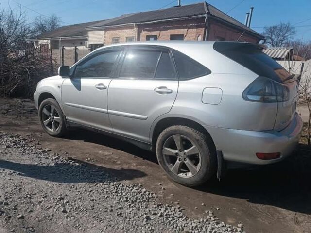 Сірий Лексус ГХ, об'ємом двигуна 3 л та пробігом 155 тис. км за 10500 $, фото 1 на Automoto.ua