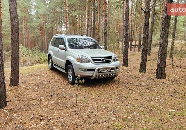 Серый Лексус ГХ, объемом двигателя 4.66 л и пробегом 285 тыс. км за 14600 $, фото 1 на Automoto.ua