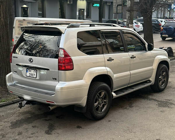 Серый Лексус ГХ, объемом двигателя 4.66 л и пробегом 300 тыс. км за 15500 $, фото 1 на Automoto.ua
