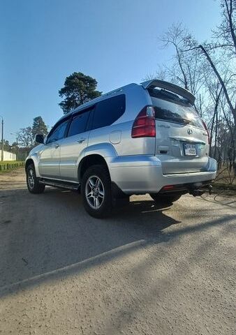 Серый Лексус ГХ, объемом двигателя 4.66 л и пробегом 325 тыс. км за 17800 $, фото 1 на Automoto.ua