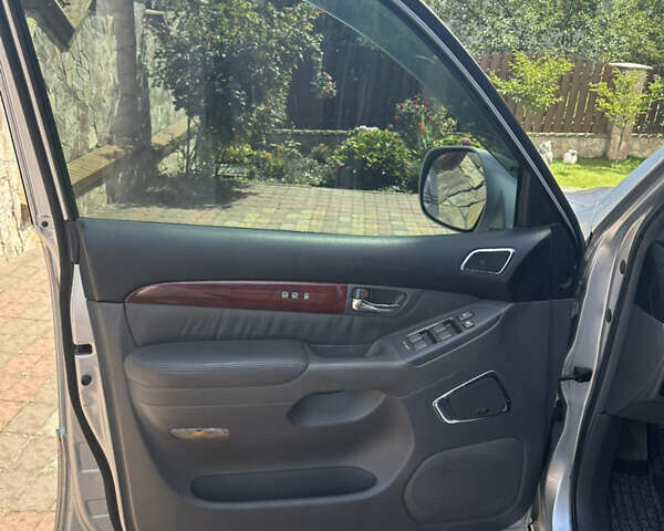 Сірий Лексус ГХ, об'ємом двигуна 4.66 л та пробігом 180 тис. км за 18900 $, фото 1 на Automoto.ua