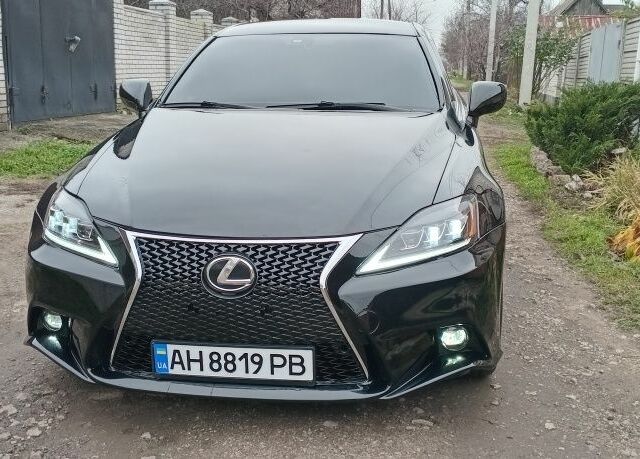 Черный Лексус ИС, объемом двигателя 2.5 л и пробегом 200 тыс. км за 9500 $, фото 1 на Automoto.ua