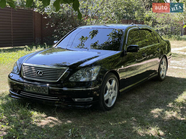 Черный Лексус ЛС, объемом двигателя 4.29 л и пробегом 320 тыс. км за 10000 $, фото 1 на Automoto.ua