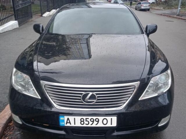 Черный Лексус ЛС, объемом двигателя 4.6 л и пробегом 142 тыс. км за 16000 $, фото 1 на Automoto.ua