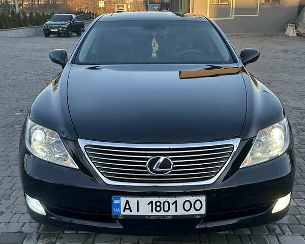 Черный Лексус ЛС, объемом двигателя 4.61 л и пробегом 185 тыс. км за 10500 $, фото 1 на Automoto.ua