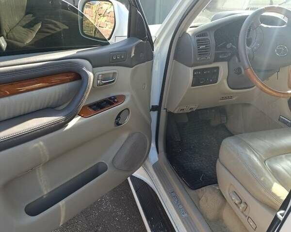 Білий Лексус ЛХ, об'ємом двигуна 4.7 л та пробігом 256 тис. км за 16500 $, фото 1 на Automoto.ua