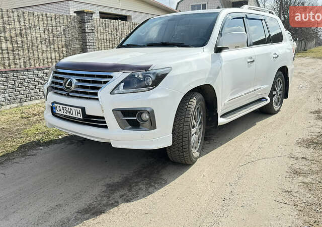 Білий Лексус ЛХ, об'ємом двигуна 5.7 л та пробігом 170 тис. км за 23000 $, фото 1 на Automoto.ua
