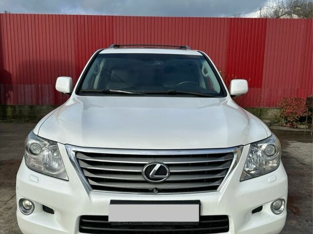 Білий Лексус ЛХ, об'ємом двигуна 5.7 л та пробігом 212 тис. км за 25000 $, фото 1 на Automoto.ua