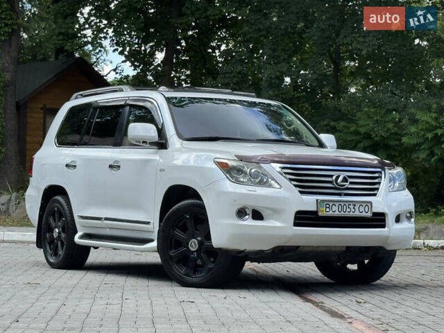 Білий Лексус ЛХ, об'ємом двигуна 5.66 л та пробігом 202 тис. км за 25500 $, фото 1 на Automoto.ua