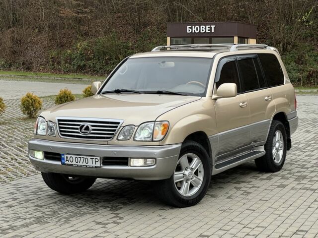 Бежевый Лексус ЛХ, объемом двигателя 4.7 л и пробегом 260 тыс. км за 13500 $, фото 1 на Automoto.ua
