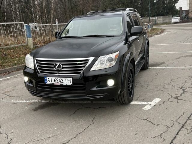 Черный Лексус ЛХ, объемом двигателя 5.7 л и пробегом 330 тыс. км за 21500 $, фото 1 на Automoto.ua