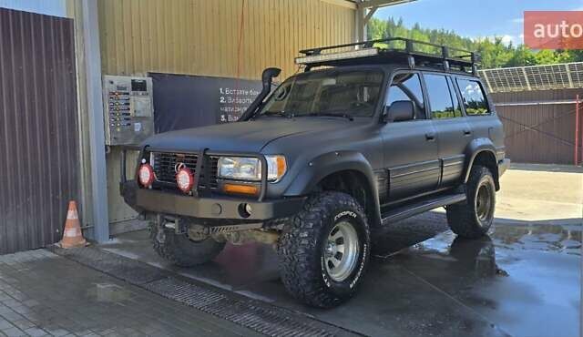 Черный Лексус ЛХ, объемом двигателя 4.48 л и пробегом 70 тыс. км за 21200 $, фото 1 на Automoto.ua