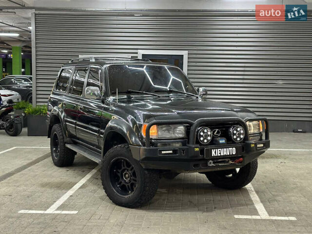 Черный Лексус ЛХ, объемом двигателя 4.5 л и пробегом 130 тыс. км за 17000 $, фото 1 на Automoto.ua