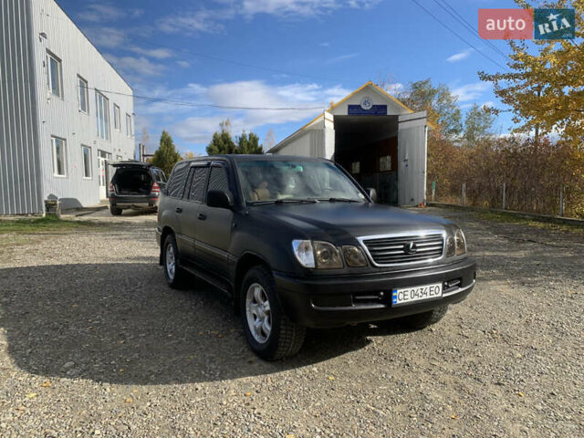 Черный Лексус ЛХ, объемом двигателя 4.66 л и пробегом 403 тыс. км за 8900 $, фото 1 на Automoto.ua