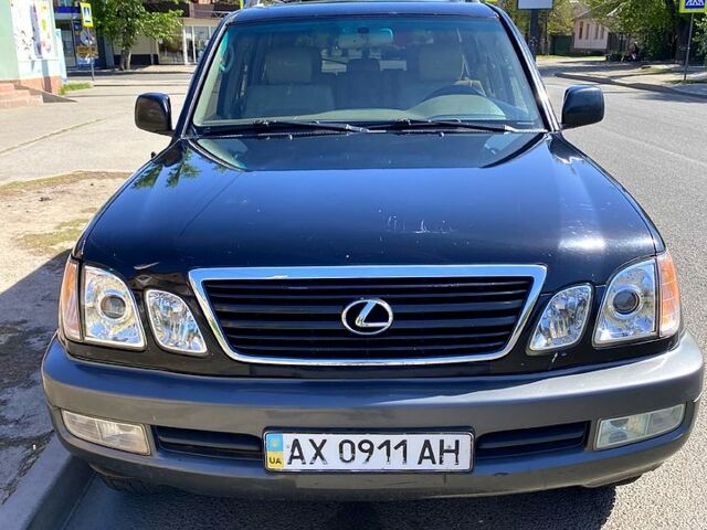 Чорний Лексус ЛХ, об'ємом двигуна 47 л та пробігом 382 тис. км за 7500 $, фото 1 на Automoto.ua