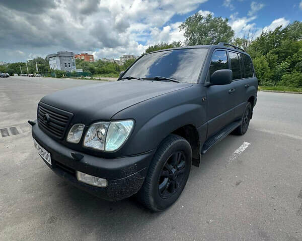 Черный Лексус ЛХ, объемом двигателя 4.7 л и пробегом 381 тыс. км за 10800 $, фото 1 на Automoto.ua