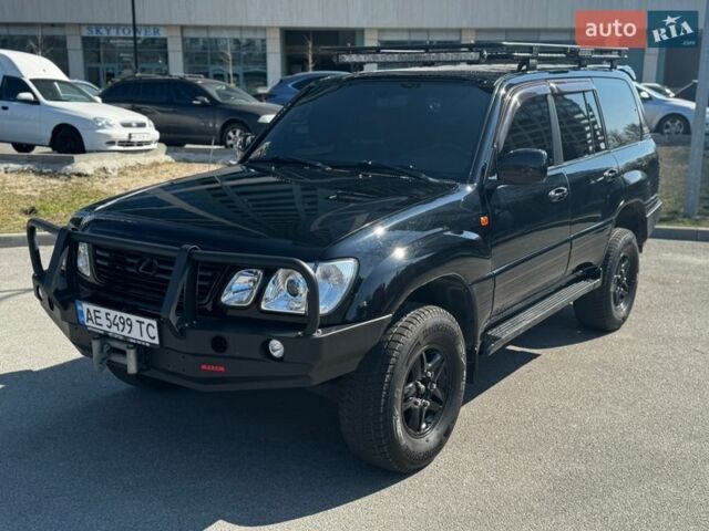 Черный Лексус ЛХ, объемом двигателя 4.66 л и пробегом 320 тыс. км за 14900 $, фото 1 на Automoto.ua