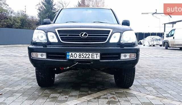 Черный Лексус ЛХ, объемом двигателя 4.7 л и пробегом 326 тыс. км за 13000 $, фото 1 на Automoto.ua