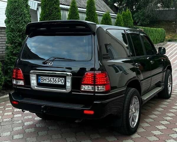 Черный Лексус ЛХ, объемом двигателя 4.66 л и пробегом 367 тыс. км за 17500 $, фото 1 на Automoto.ua