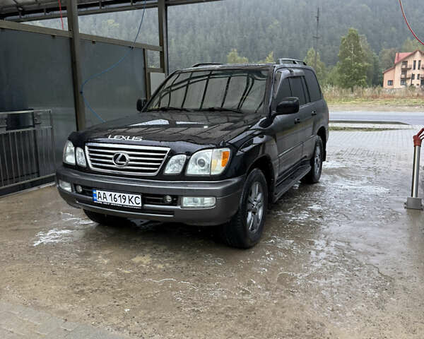 Чорний Лексус ЛХ, об'ємом двигуна 4.66 л та пробігом 260 тис. км за 14500 $, фото 1 на Automoto.ua