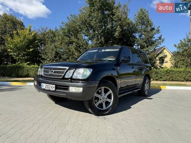 Черный Лексус ЛХ, объемом двигателя 4.66 л и пробегом 380 тыс. км за 15500 $, фото 1 на Automoto.ua