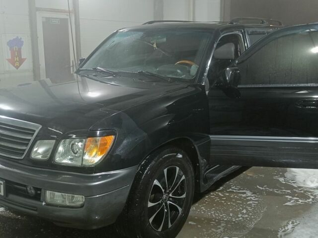 Чорний Лексус ЛХ, об'ємом двигуна 4.7 л та пробігом 440 тис. км за 10500 $, фото 1 на Automoto.ua