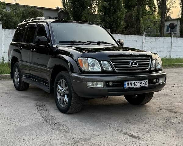 Черный Лексус ЛХ, объемом двигателя 4.67 л и пробегом 255 тыс. км за 14000 $, фото 1 на Automoto.ua