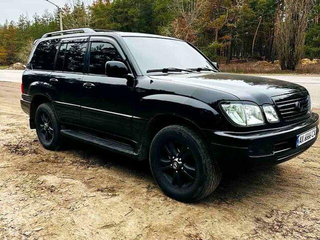 Черный Лексус ЛХ, объемом двигателя 4.7 л и пробегом 169 тыс. км за 20000 $, фото 1 на Automoto.ua