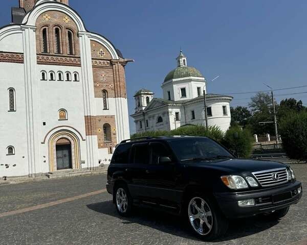Черный Лексус ЛХ, объемом двигателя 4.7 л и пробегом 370 тыс. км за 14800 $, фото 1 на Automoto.ua