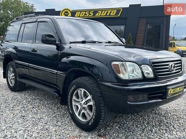 Черный Лексус ЛХ, объемом двигателя 4.7 л и пробегом 259 тыс. км за 17200 $, фото 1 на Automoto.ua
