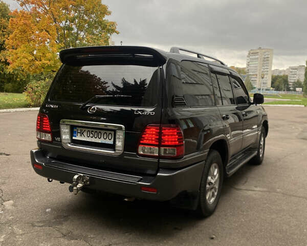Черный Лексус ЛХ, объемом двигателя 4.66 л и пробегом 298 тыс. км за 15600 $, фото 1 на Automoto.ua