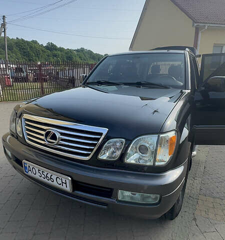 Черный Лексус ЛХ, объемом двигателя 4.66 л и пробегом 352 тыс. км за 15600 $, фото 1 на Automoto.ua