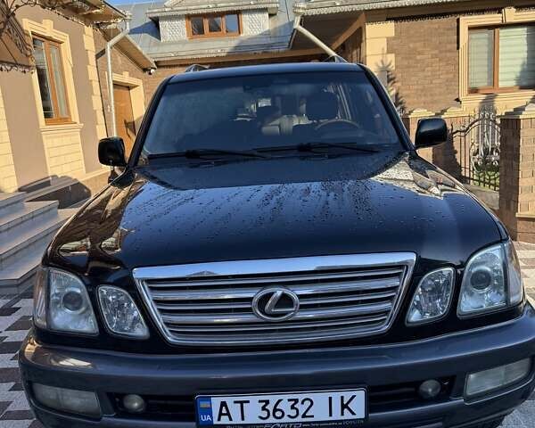 Черный Лексус ЛХ, объемом двигателя 4.66 л и пробегом 292 тыс. км за 12800 $, фото 1 на Automoto.ua