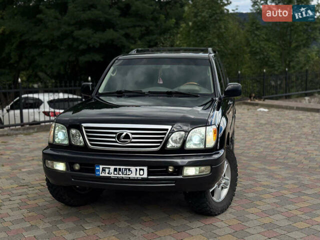 Чорний Лексус ЛХ, об'ємом двигуна 4.7 л та пробігом 263 тис. км за 14200 $, фото 1 на Automoto.ua