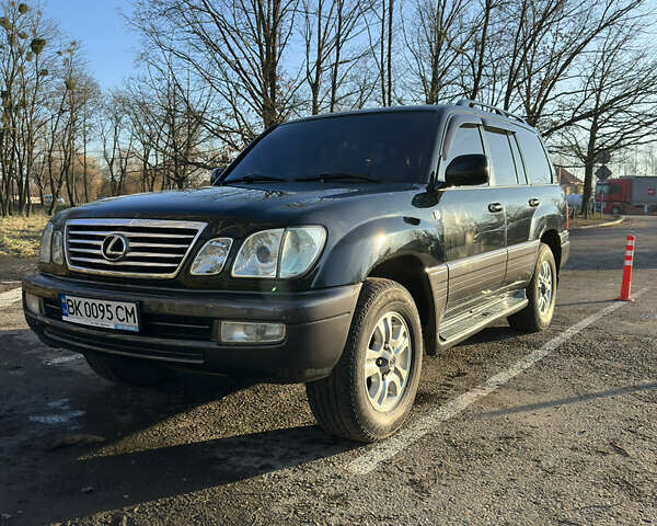 Черный Лексус ЛХ, объемом двигателя 4.66 л и пробегом 285 тыс. км за 15500 $, фото 1 на Automoto.ua