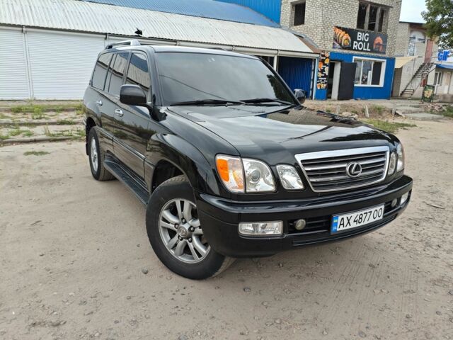 Черный Лексус ЛХ, объемом двигателя 4.7 л и пробегом 330 тыс. км за 14500 $, фото 1 на Automoto.ua