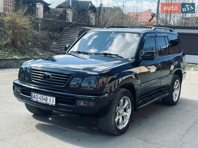 Черный Лексус ЛХ, объемом двигателя 4.66 л и пробегом 303 тыс. км за 12800 $, фото 1 на Automoto.ua