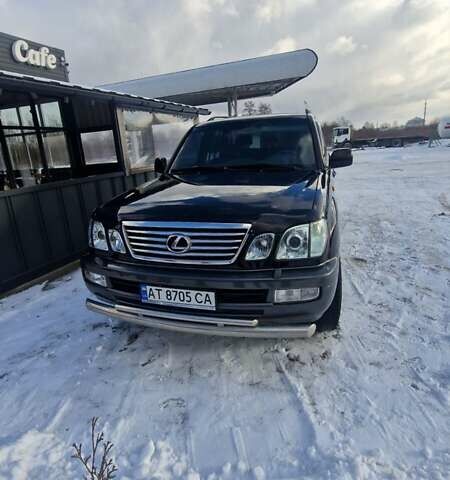 Черный Лексус ЛХ, объемом двигателя 4.7 л и пробегом 297 тыс. км за 14800 $, фото 1 на Automoto.ua