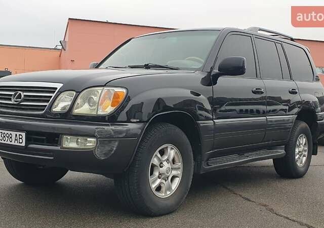 Черный Лексус ЛХ, объемом двигателя 4.66 л и пробегом 171 тыс. км за 12000 $, фото 1 на Automoto.ua