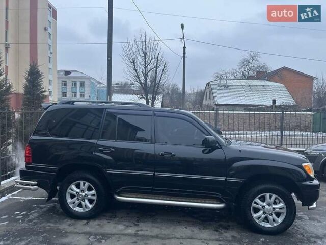 Черный Лексус ЛХ, объемом двигателя 4.7 л и пробегом 230 тыс. км за 14500 $, фото 1 на Automoto.ua
