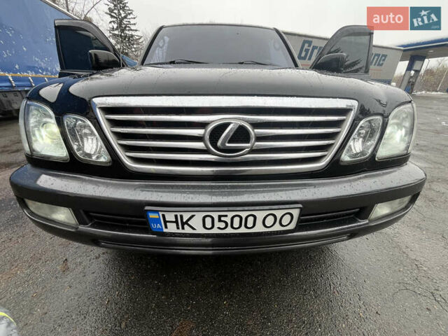 Черный Лексус ЛХ, объемом двигателя 4.6 л и пробегом 300 тыс. км за 13777 $, фото 1 на Automoto.ua