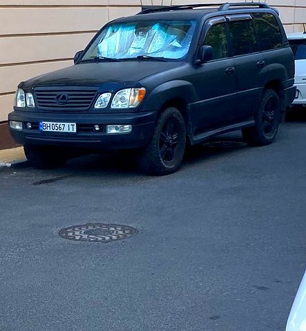 Черный Лексус ЛХ, объемом двигателя 4.7 л и пробегом 277 тыс. км за 14500 $, фото 1 на Automoto.ua