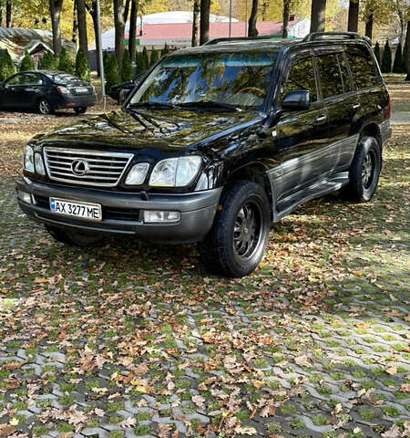 Черный Лексус ЛХ, объемом двигателя 4.7 л и пробегом 350 тыс. км за 12200 $, фото 1 на Automoto.ua