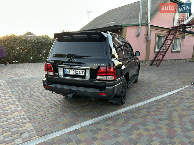 Чорний Лексус ЛХ, об'ємом двигуна 4.7 л та пробігом 270 тис. км за 14200 $, фото 1 на Automoto.ua